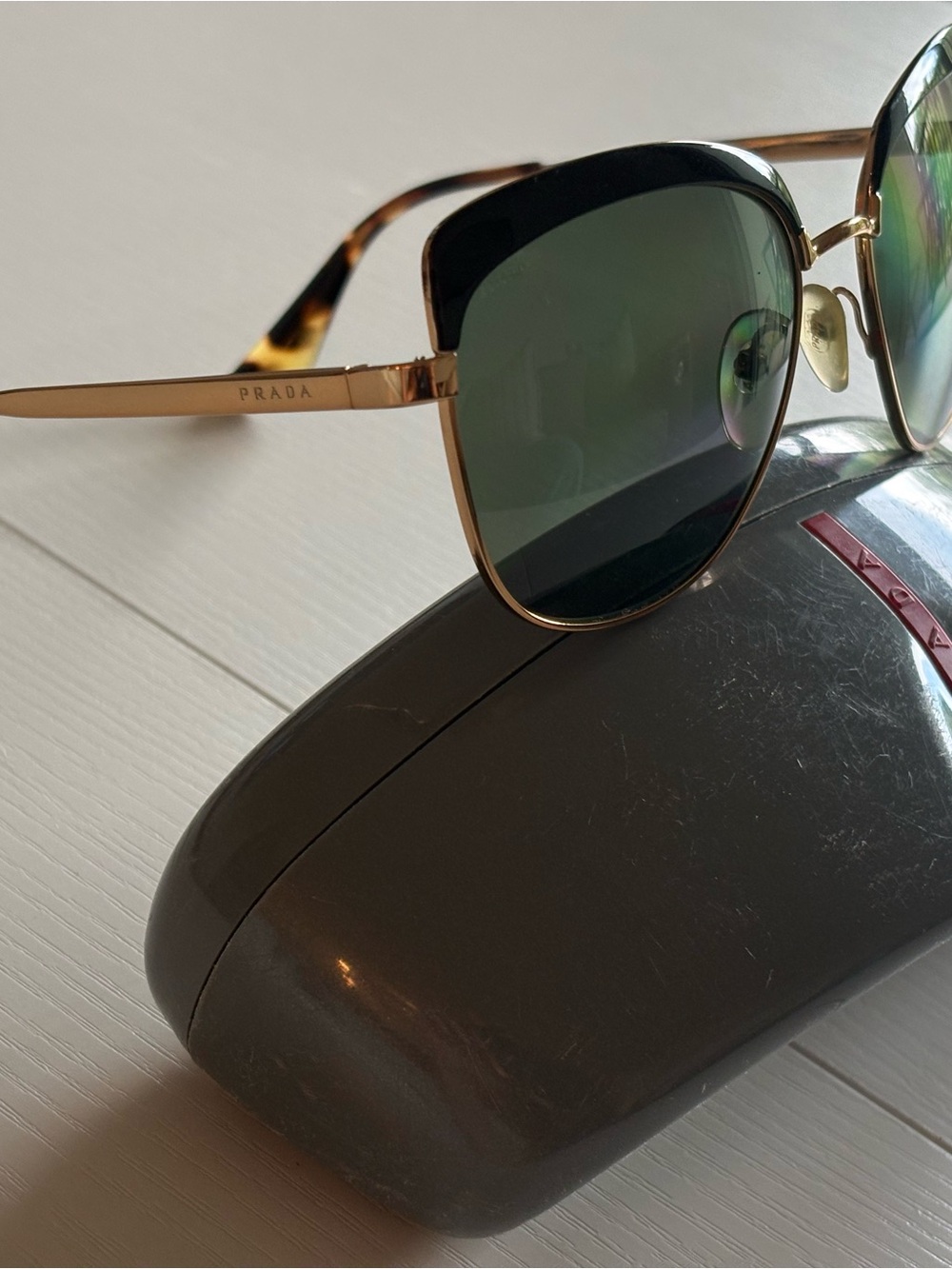 Prada Gold Frame Sunglasses with Dark Green Lenses
